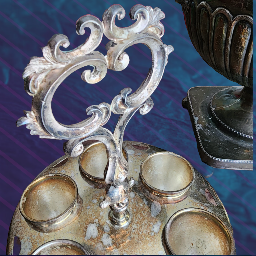 Antique Egg Cup Holder with intricate silver detailing and six egg cups