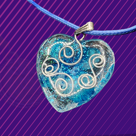 Resin heart shaped pendant with wire and flowers on a blue paracord - Devil n Dove Online