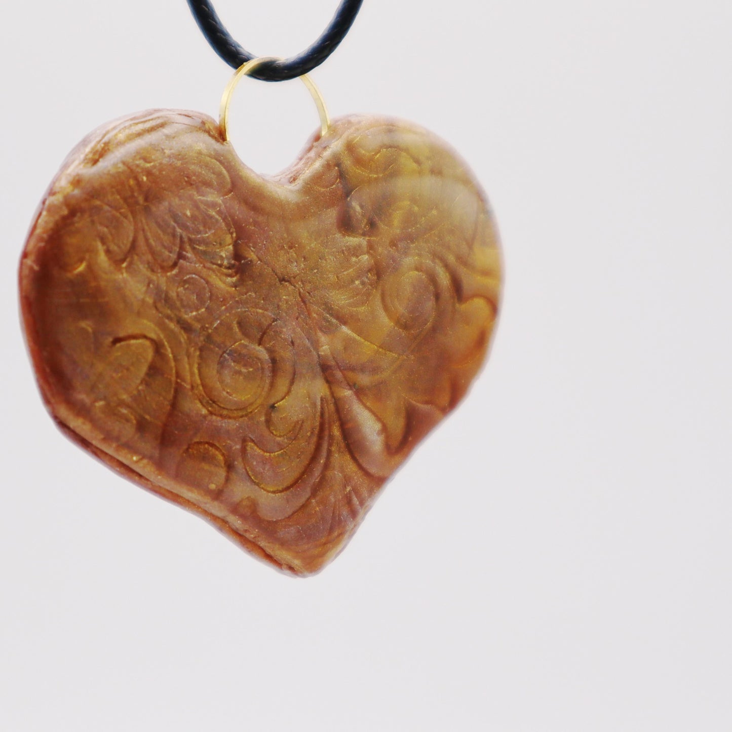 Golden Embossed Heart Pendant - Devil n Dove Online