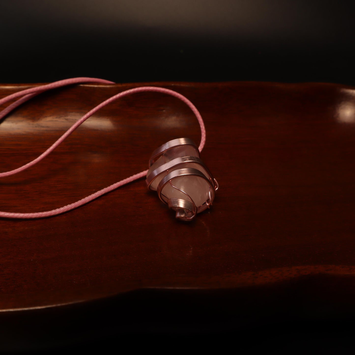 Rose Gold Coloured Wire Wrapped Pink Stone Pendant