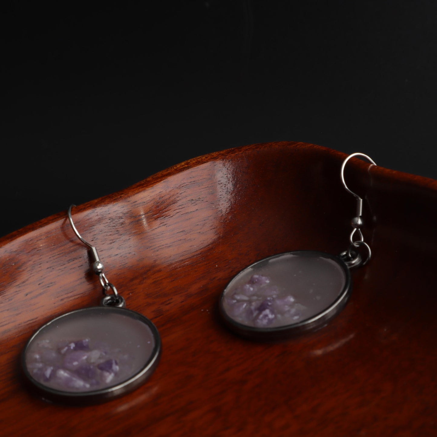 Lavender gemstone earrings in clear resin and silver frame with delicate lavender stones 