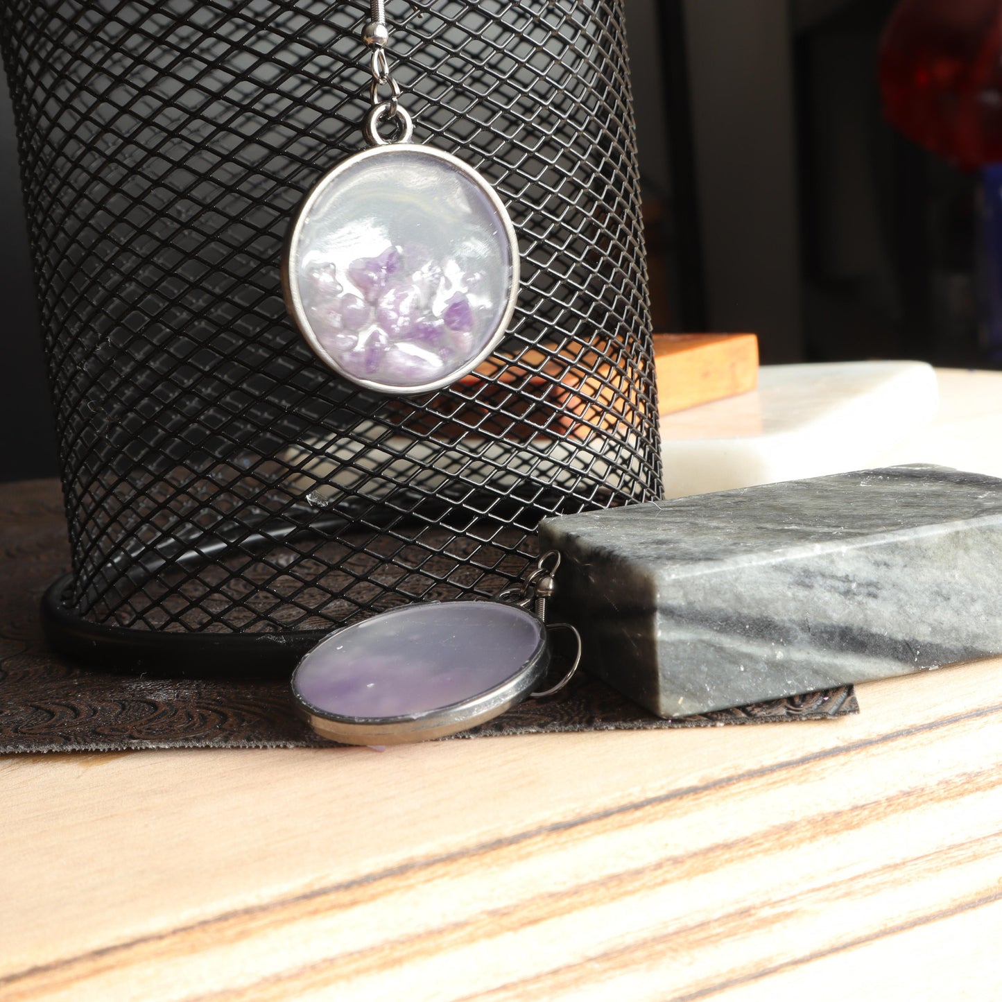 Lavender gemstone earrings in clear resin and silver frame with delicate lavender stones 