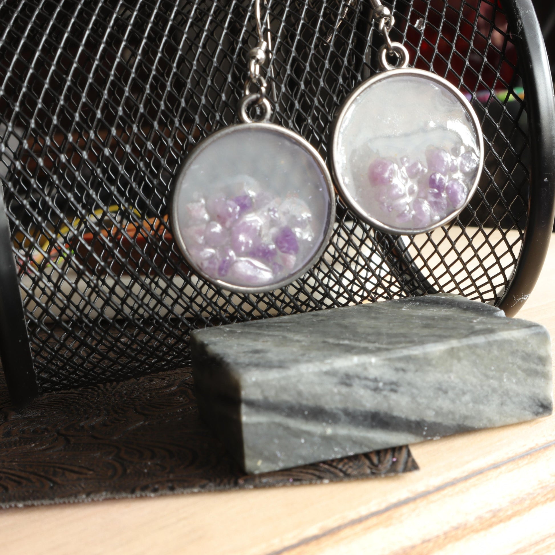 Lavender gemstone earrings in clear resin and silver frame with delicate lavender stones 