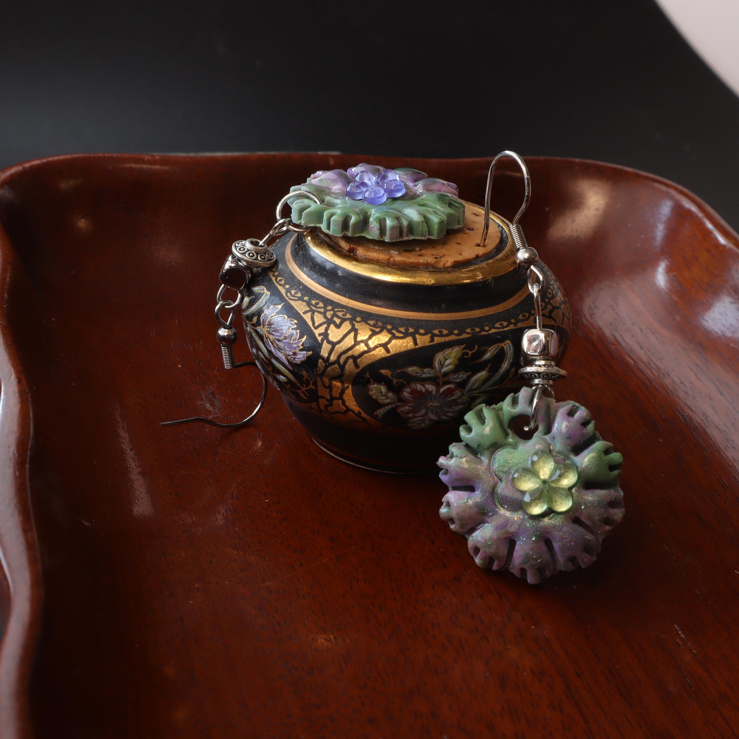 Floral polymer clay earrings with lavender and green petals, handcrafted and lightweight