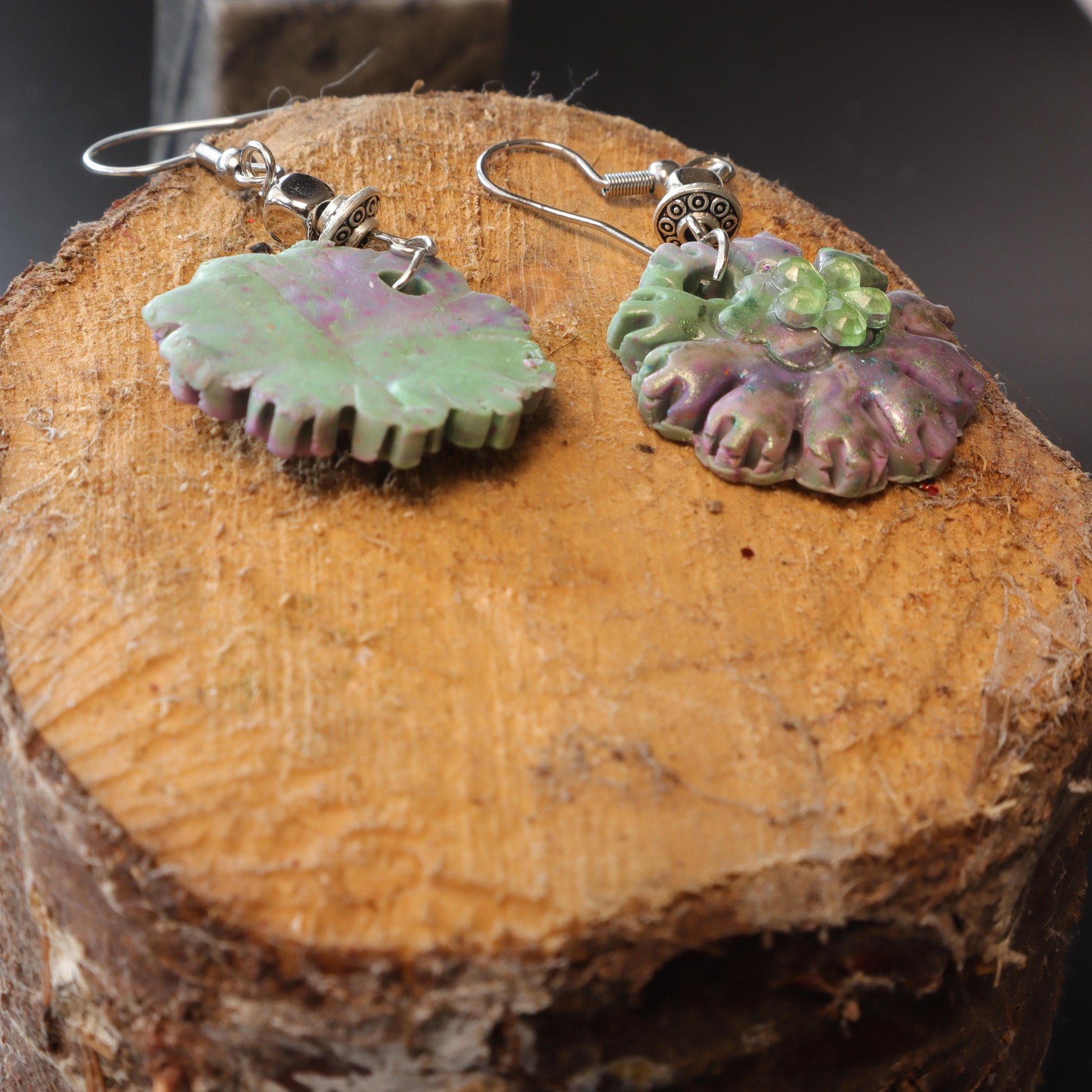 Floral polymer clay earrings with lavender and green petals, handcrafted and lightweight