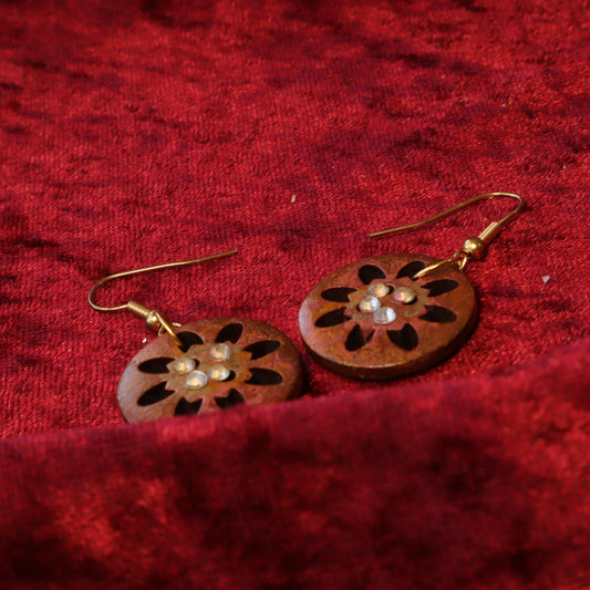 Vintage button earrings with floral cutout design and rhinestone accents