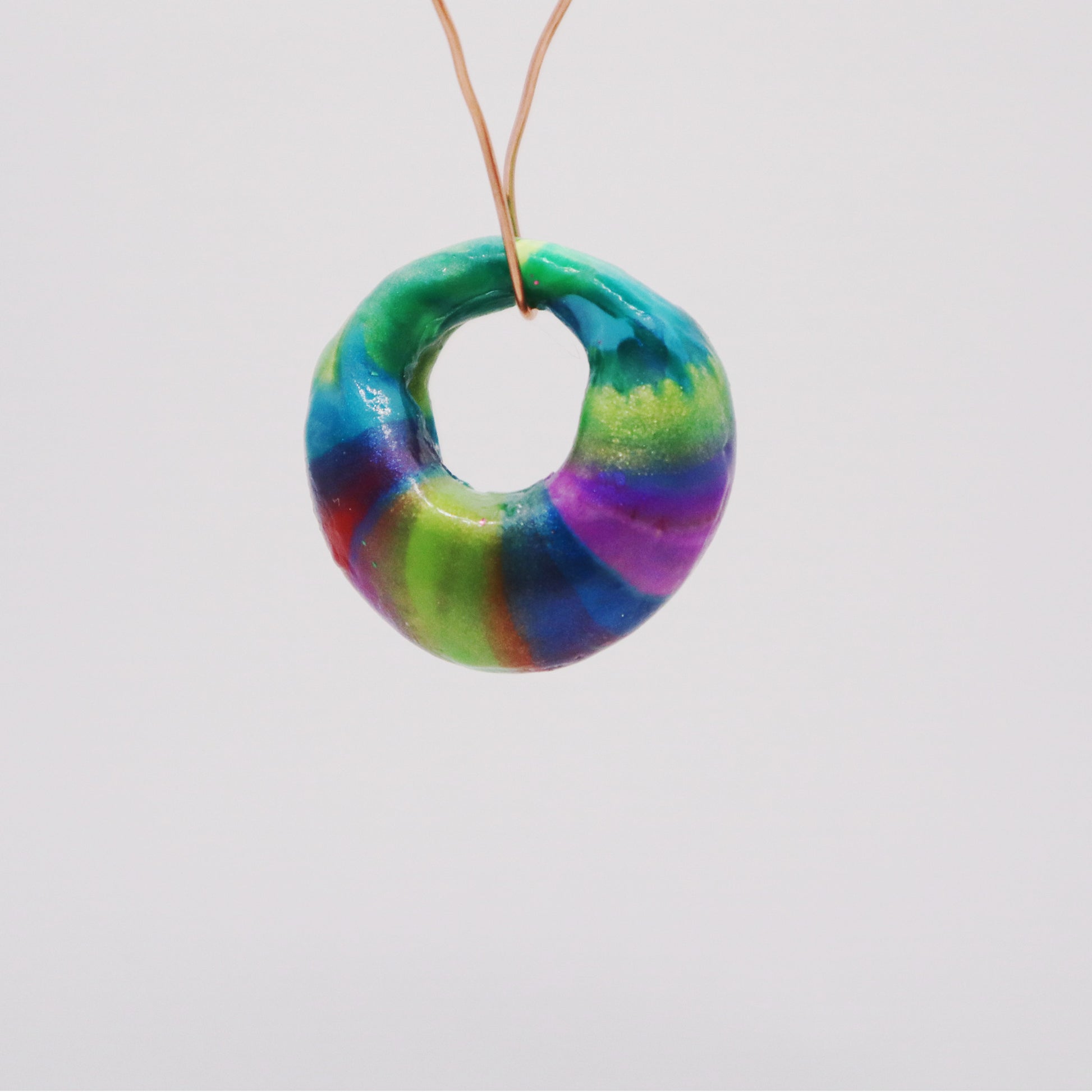 Vivid Whorl: Spectrum Donut Pendant - Devil n Dove Online